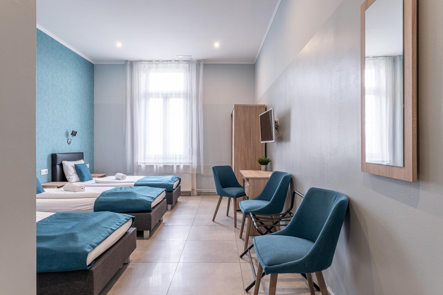 Chambre Double avec Lit d'Appoint (3 Adultes)